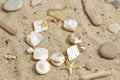 Armband met schelpen, zee charms en goude kraaltjes
