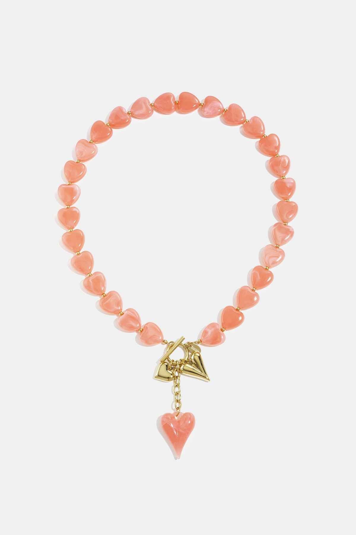 Bead necklace with hanging heart charms